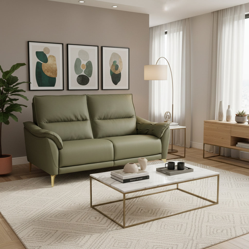 Green sofa with gold legs on a white background